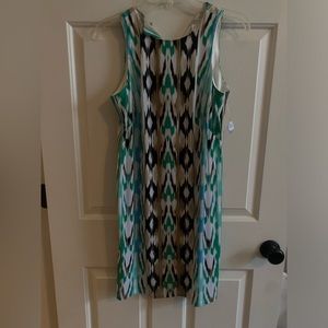 London Times sleeveless women’s dress size 4. Still with tags-never been worn.